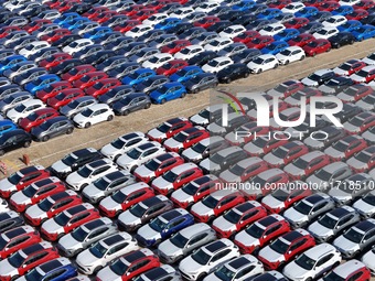 A large number of Chinese-made vehicles gather at Yantai Port waiting to be loaded for export in Yantai, Shandong province, China, on Octobe...