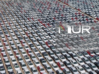 A large number of Chinese-made vehicles gather at Yantai Port waiting to be loaded for export in Yantai, Shandong province, China, on Octobe...