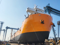 Workers produce ship hulls at Tuangang Community Shipbuilding base in Yanweigang town, Guanyun County, Lianyungang, China, on October 29, 20...