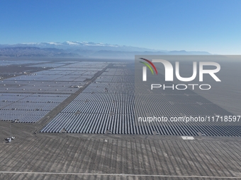 An aerial photo shows the Shichengzi Photovoltaic Industrial Park in Hami, Xinjiang province, China, on October 26, 2024. With a planned tot...