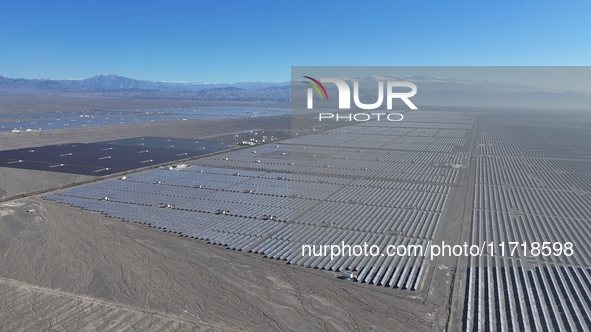 An aerial photo shows the Shichengzi Photovoltaic Industrial Park in Hami, Xinjiang province, China, on October 26, 2024. With a planned tot...