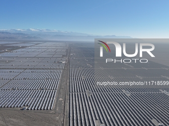 An aerial photo shows the Shichengzi Photovoltaic Industrial Park in Hami, Xinjiang province, China, on October 26, 2024. With a planned tot...