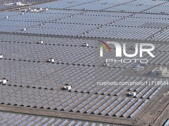 An aerial photo shows the Shichengzi Photovoltaic Industrial Park in Hami, Xinjiang province, China, on October 26, 2024. With a planned tot...