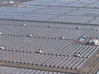 An aerial photo shows the Shichengzi Photovoltaic Industrial Park in Hami, Xinjiang province, China, on October 26, 2024. With a planned tot...