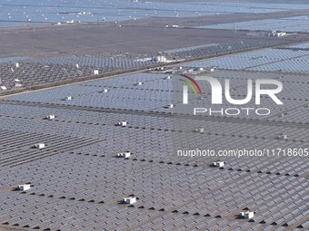 An aerial photo shows the Shichengzi Photovoltaic Industrial Park in Hami, Xinjiang province, China, on October 26, 2024. With a planned tot...