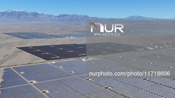 An aerial photo shows the Shichengzi Photovoltaic Industrial Park in Hami, Xinjiang province, China, on October 26, 2024. With a planned tot...