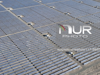 An aerial photo shows the Shichengzi Photovoltaic Industrial Park in Hami, Xinjiang province, China, on October 26, 2024. With a planned tot...