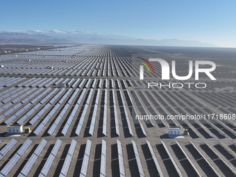 An aerial photo shows the Shichengzi Photovoltaic Industrial Park in Hami, Xinjiang province, China, on October 26, 2024. With a planned tot...