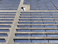 An aerial photo shows the Shichengzi Photovoltaic Industrial Park in Hami, Xinjiang province, China, on October 26, 2024. With a planned tot...