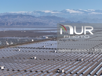 An aerial photo shows the Shichengzi Photovoltaic Industrial Park in Hami, Xinjiang province, China, on October 26, 2024. With a planned tot...