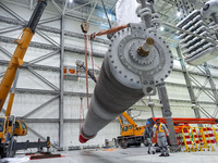 Power maintenance personnel overhaul the equipment of Guquan converter station in Xuancheng, China, on October 29, 2024. (