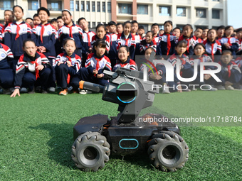 Elementary school students watch the Mech Master in Handan, China, on October 29, 2024. (