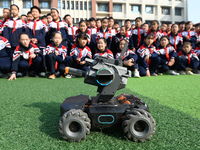 Elementary school students watch the Mech Master in Handan, China, on October 29, 2024. (