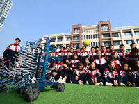 In Handan, China, on October 29, 2024, primary school students look at maker works in Handan, North China's Hebei province. (