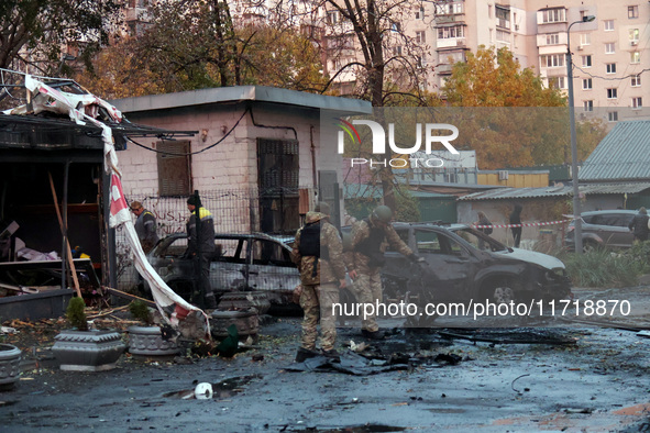 In Kyiv, Ukraine, on October 29, 2024, law enforcers pick up the fragments of a Russian UAV after a Russian drone attack. Six people are inj...