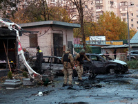 In Kyiv, Ukraine, on October 29, 2024, law enforcers pick up the fragments of a Russian UAV after a Russian drone attack. Six people are inj...