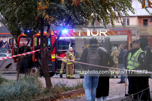 Rescuers stand by a fire engine in the Solomianskyi district after a Russian drone attack in Kyiv, Ukraine, on October 29, 2024. Six people...