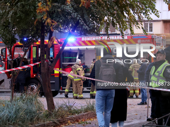 Rescuers stand by a fire engine in the Solomianskyi district after a Russian drone attack in Kyiv, Ukraine, on October 29, 2024. Six people...