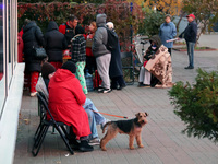 People affected by a Russian drone attack stay outdoors in Kyiv, Ukraine, on October 29, 2024. Six people are injured, and 15 people are eva...