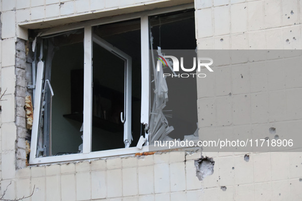 A shattered window is at an apartment block in the Solomianskyi district damaged by a Russian drone attack in Kyiv, Ukraine, on October 29,...