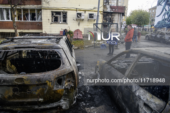 Cars burn down after a Russian drone strike in Kyiv, Ukraine, on October 29, 2024 