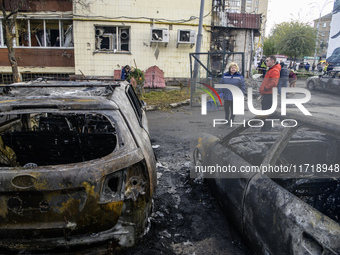 Cars burn down after a Russian drone strike in Kyiv, Ukraine, on October 29, 2024 (