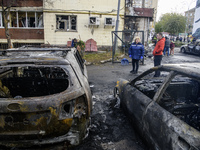 Cars burn down after a Russian drone strike in Kyiv, Ukraine, on October 29, 2024 (