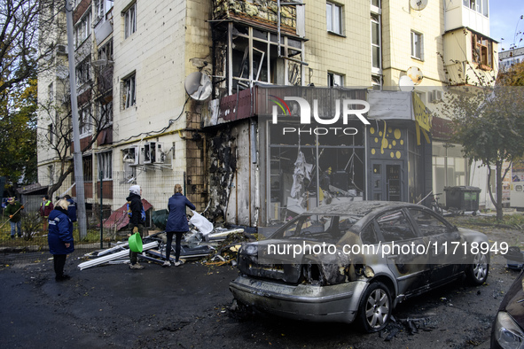 Cars burn down after a Russian drone strike in Kyiv, Ukraine, on October 29, 2024 