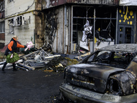 Experts inspect the site of a Russian drone strike in Kyiv, Ukraine, on October 29, 2024 (