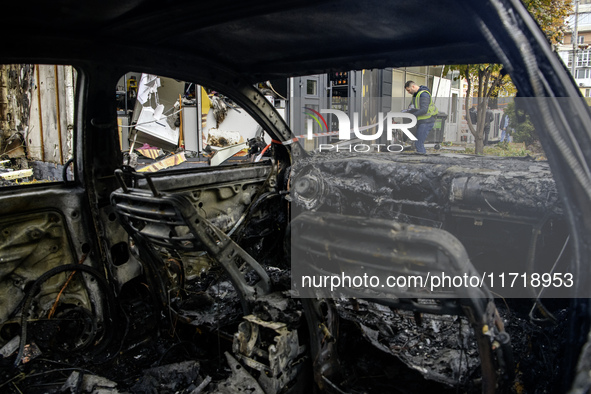 Cars burn down after a Russian drone strike in Kyiv, Ukraine, on October 29, 2024 