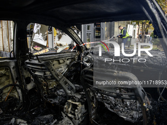 Cars burn down after a Russian drone strike in Kyiv, Ukraine, on October 29, 2024 (