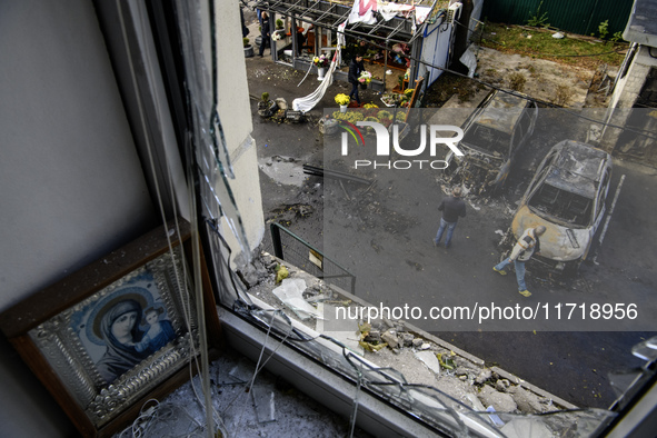 The view from the damaged apartment to the site of a Russian drone strike near a residential building in Kyiv, Ukraine, on October 29, 2024,...