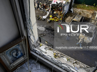 The view from the damaged apartment to the site of a Russian drone strike near a residential building in Kyiv, Ukraine, on October 29, 2024,...