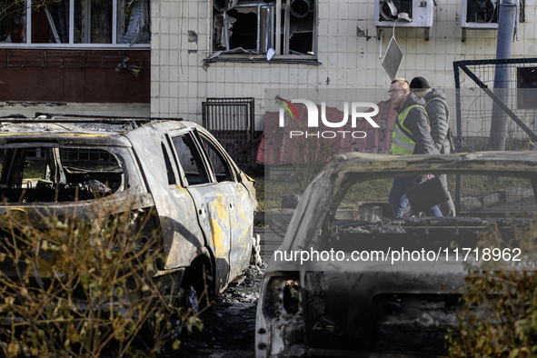 Cars burn down after a Russian drone strike in Kyiv, Ukraine, on October 29, 2024 