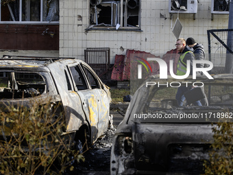 Cars burn down after a Russian drone strike in Kyiv, Ukraine, on October 29, 2024 (