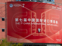 A poster for the 7th China International Import Expo is seen on a building in Shanghai, China, on October 29, 2024. (