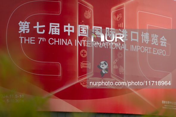 A poster for the 7th China International Import Expo is seen on a building in Shanghai, China, on October 29, 2024. 