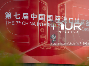 A poster for the 7th China International Import Expo is seen on a building in Shanghai, China, on October 29, 2024. (