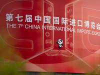 A poster for the 7th China International Import Expo is seen on a building in Shanghai, China, on October 29, 2024. (