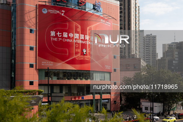 A poster for the 7th China International Import Expo is seen on a building in Shanghai, China, on October 29, 2024. 