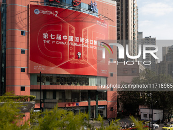 A poster for the 7th China International Import Expo is seen on a building in Shanghai, China, on October 29, 2024. (