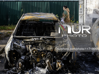 Cars burn down after a Russian drone strike in Kyiv, Ukraine, on October 29, 2024 (