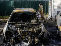 Cars burn down after a Russian drone strike in Kyiv, Ukraine, on October 29, 2024 (