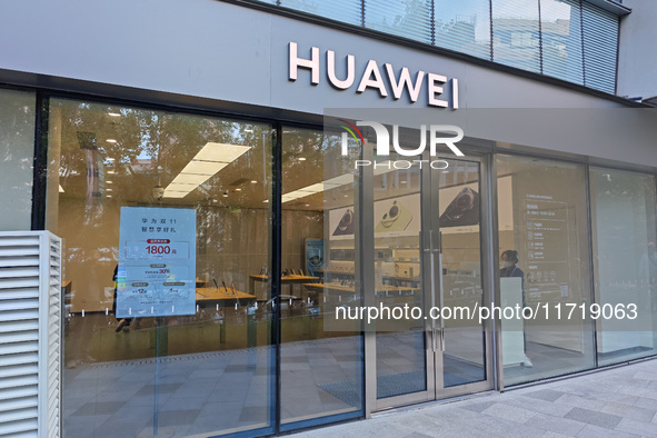 An advertisement for the ''Double 11'' sales promotion is displayed at a Huawei store in Shanghai, China, on October 29, 2024. 