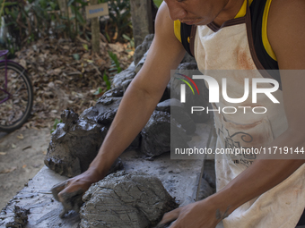 A man creates ceramic art typical of Marajo Island, located at the mouth of the Amazon River and considered the largest fluvial-maritime isl...