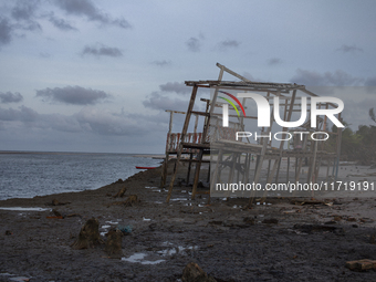 Houses are condemned due to rising sea levels caused by climate change on Marajo Island, located at the mouth of the Amazon River, in Soure,...