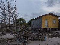 Houses are condemned due to rising sea levels caused by climate change on Marajo Island, located at the mouth of the Amazon River, in Soure,...