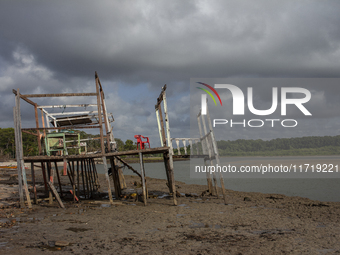 Houses are condemned due to rising sea levels caused by climate change on Marajo Island, located at the mouth of the Amazon River, in Soure,...