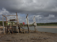 Houses are condemned due to rising sea levels caused by climate change on Marajo Island, located at the mouth of the Amazon River, in Soure,...