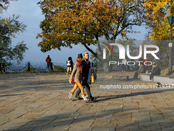 People are on the observation deck on Starokyivska (Old Kyiv) Hill in Kyiv, Ukraine, on October 28, 2024. NO USE RUSSIA. NO USE BELARUS. (